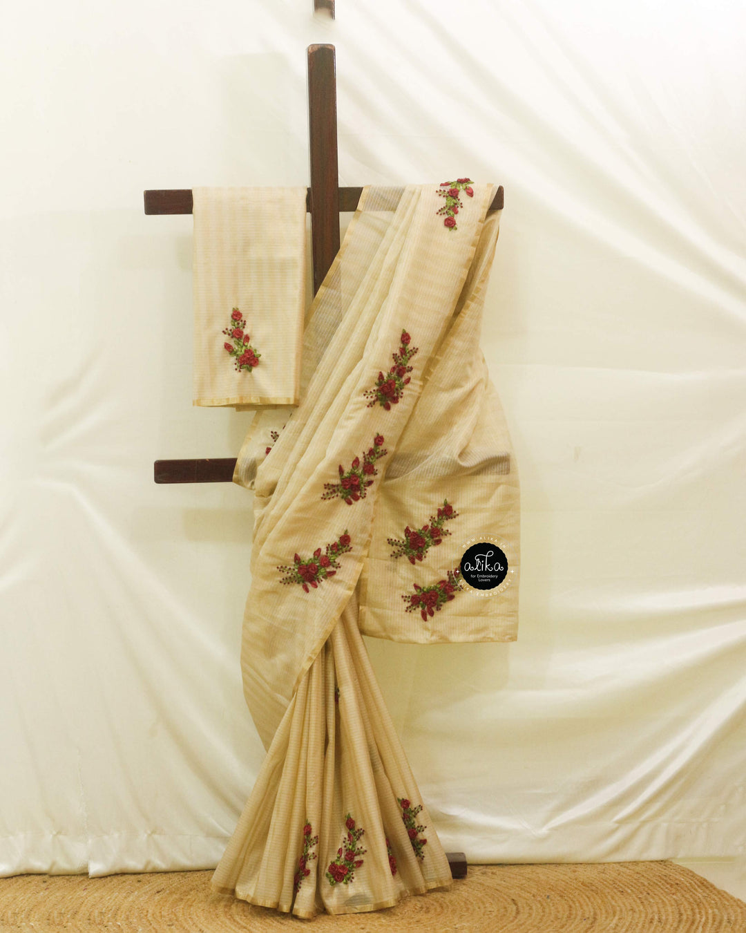 Gold Semi tissue Saree with Golden Stripes and Maroon Ribbon Work