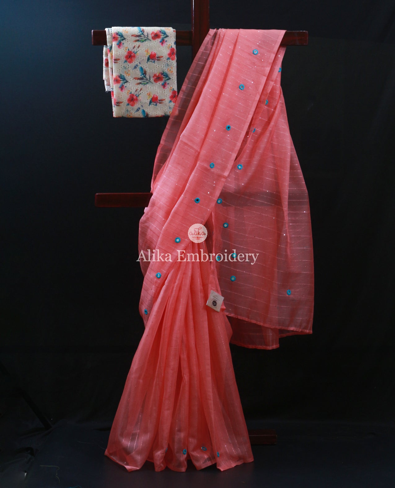 Captivating Peach Organza Saree with Intricate Glass Work Embellishments
