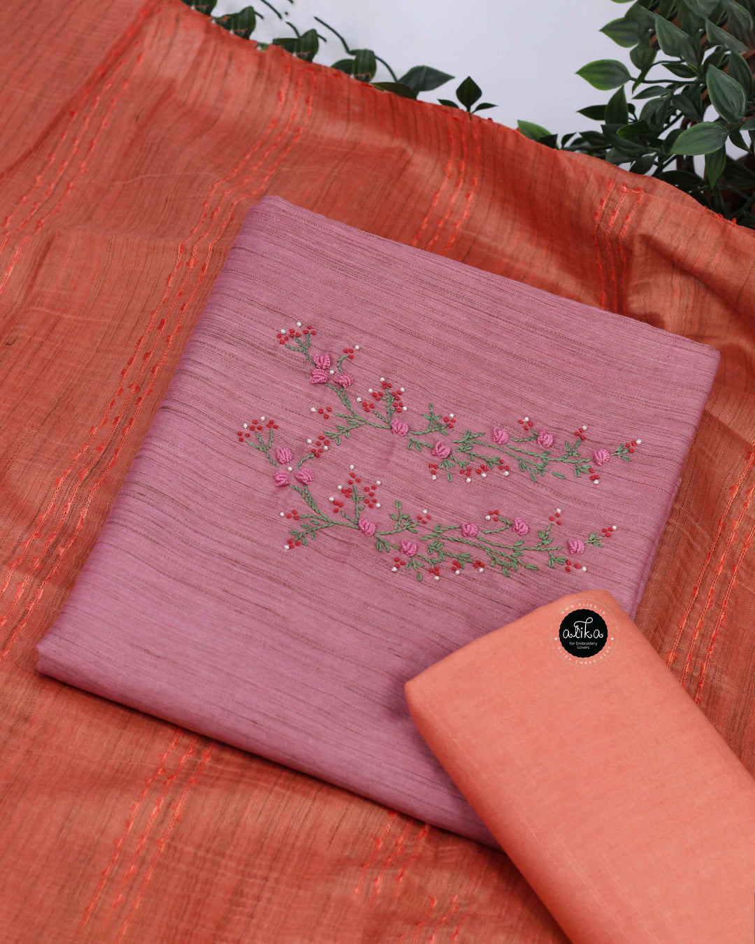 Dusty Pink Bamboo Silk Unstitched Salwar Set with Floral Hand Embroidery on the neckline and sleeves