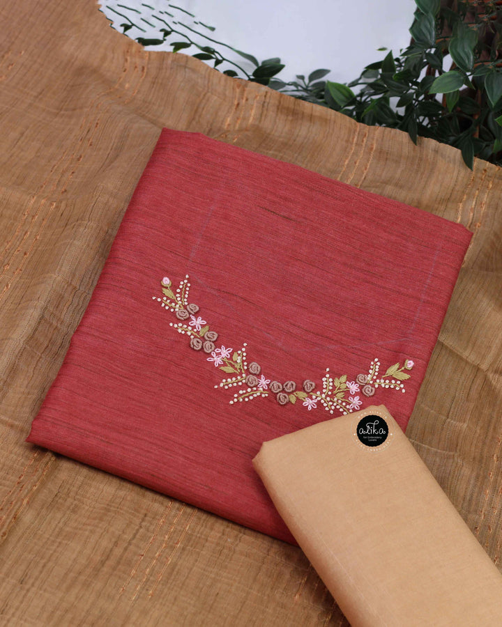 Rust Red Bamboo Silk Unstitched Salwar Set with Floral Hand Embroidery on the neckline and sleeves
