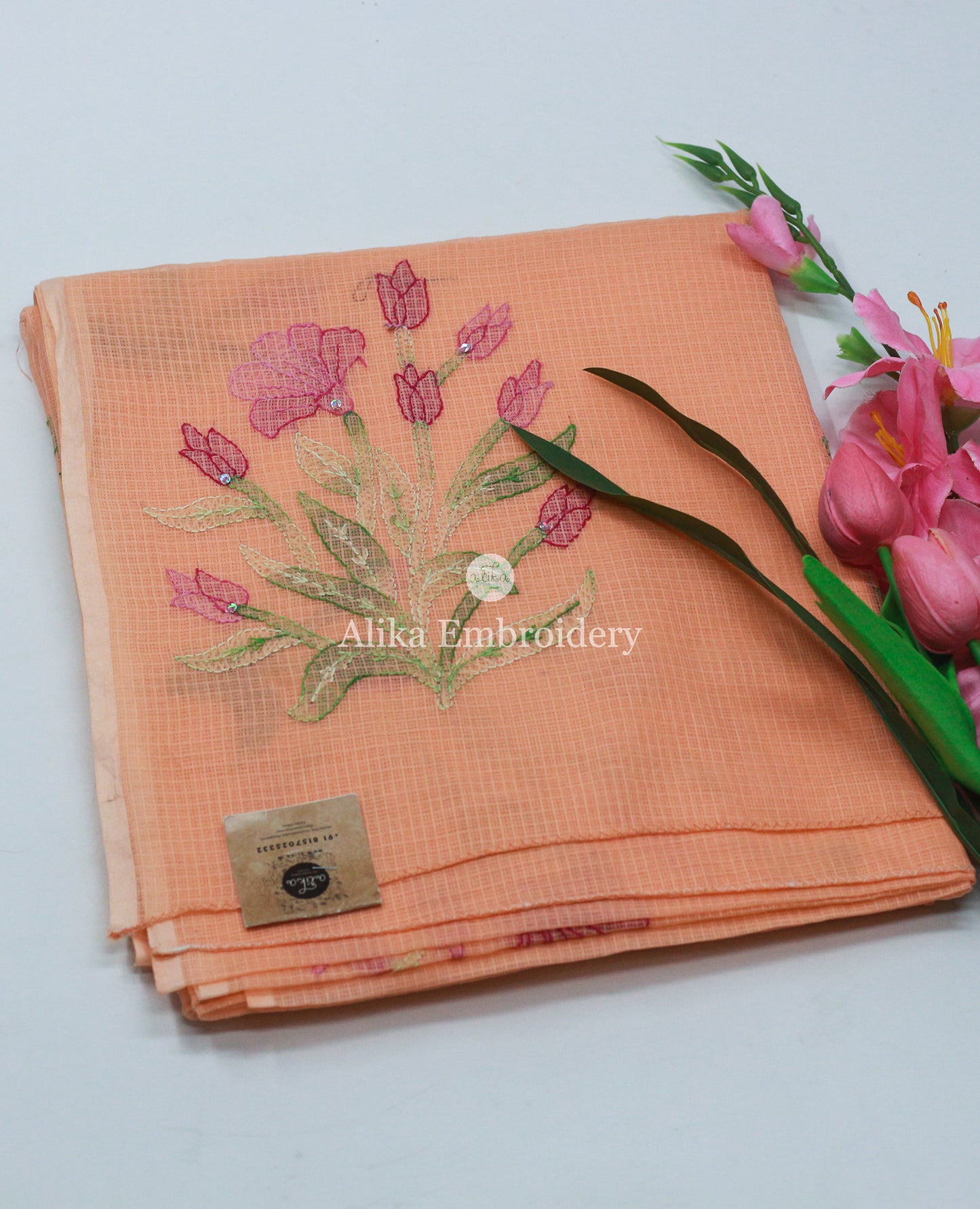 Chic Peach Checked Kota Saree with Pink Floral Shadow Work