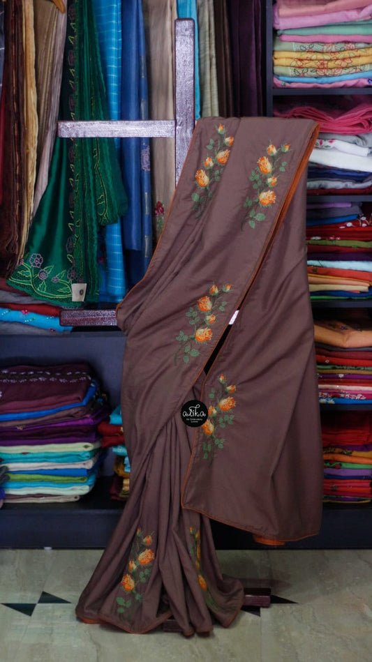 Brown semi silk saree with cross  stitch