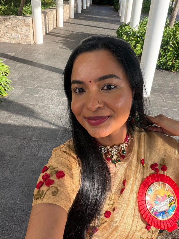 Customer wearing Pure golden tissue Saree with floral hand embroidery