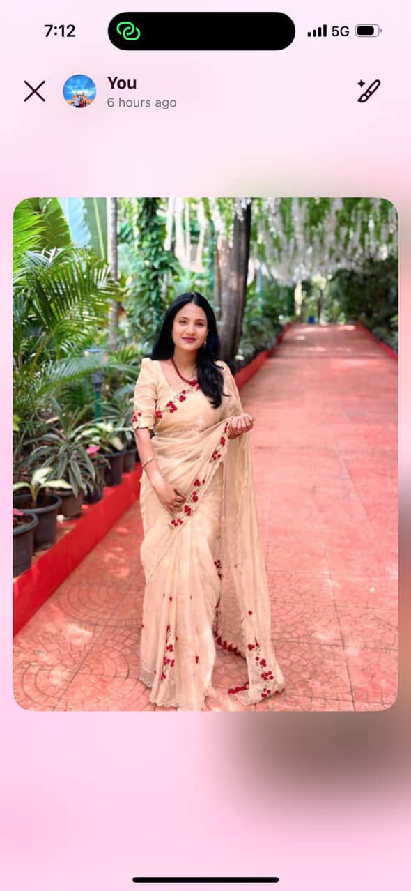 Customer wearing Pure golden tissue Saree with floral hand embroidery