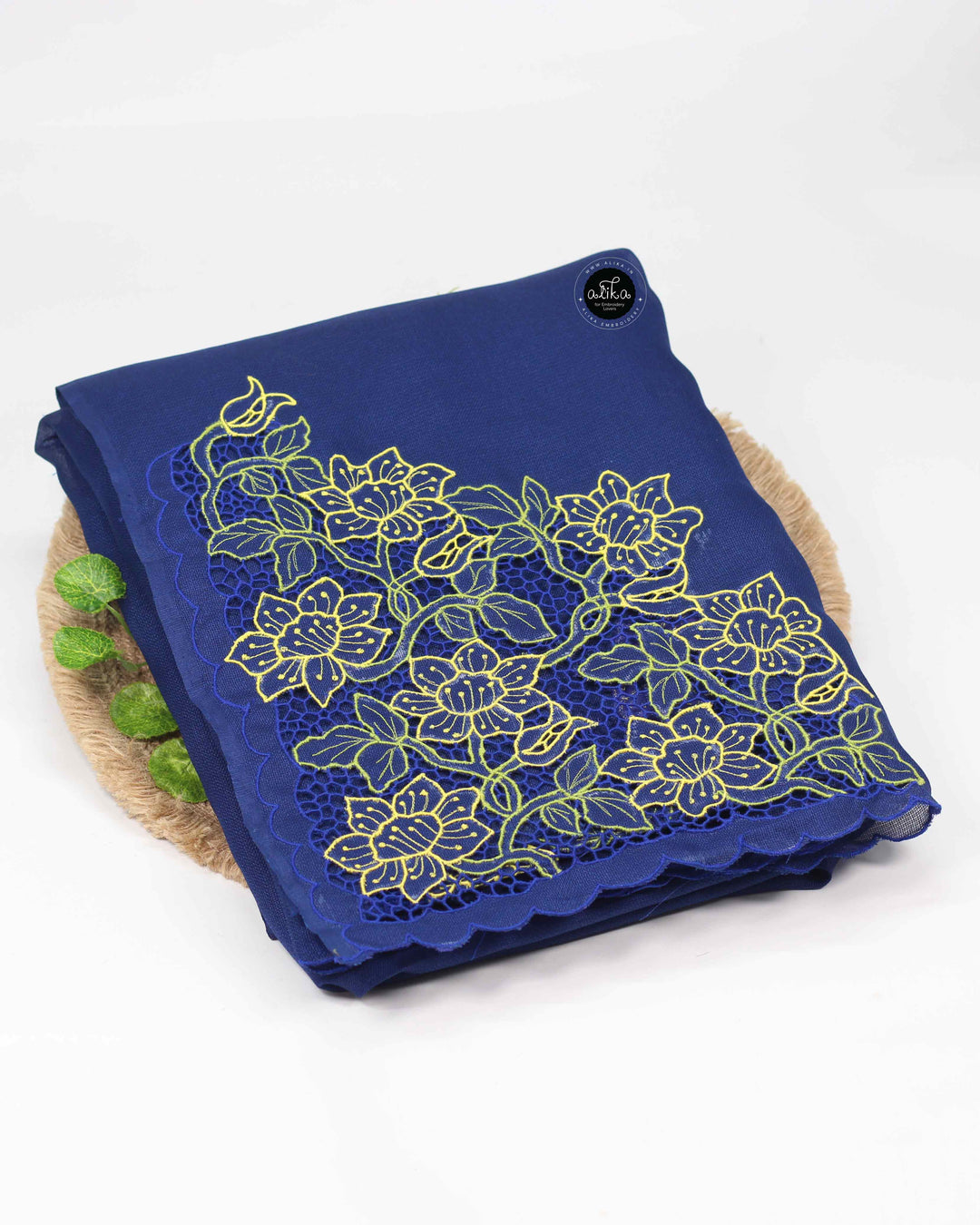 BLUE JUTE NET SAREE WITH TWINE CUTWORK AND FLORAL MACHINE EMBROIDERY