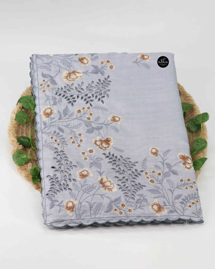 Light Gray Semi Silk Saree with Floral Machine Embroidery and Cutwork Border
