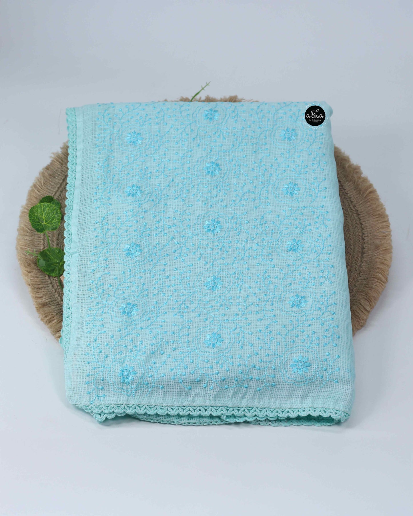 Sky Blue silky Kota saree with floral machine embroidery and lace work