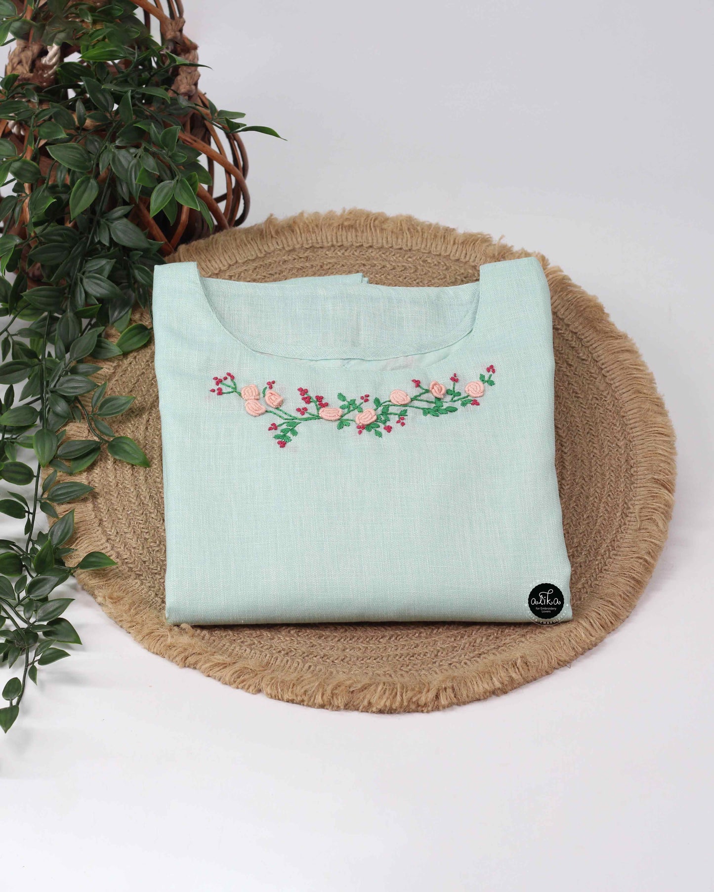 Mint green Semi-Linen Stitched Kurti with Floral Hand Embroidery on Neckline & Top of the Sleeves