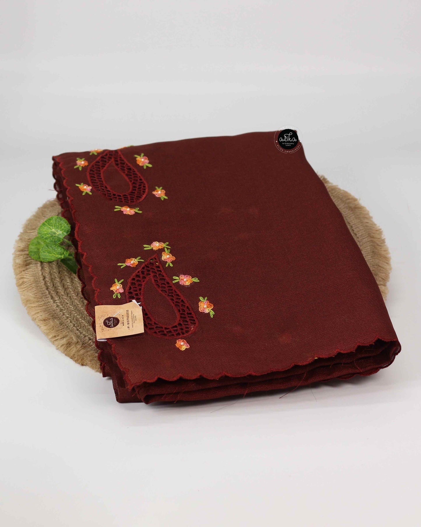 brown jute saree with floral embroidery and cutwork