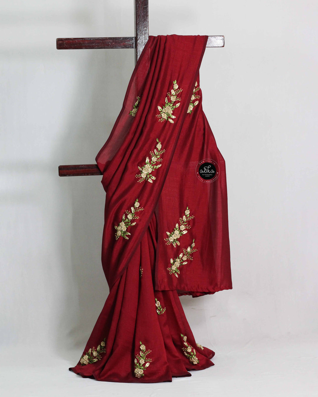 Maroon Designer Silk Saree with Golden Floral Ribbon Work