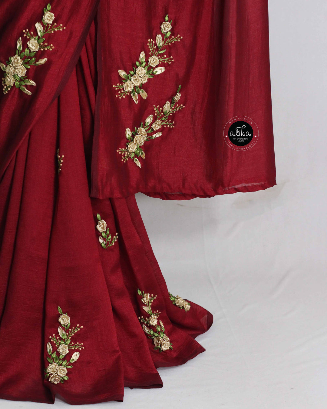 Maroon Designer Silk Saree with Golden Floral Ribbon Work