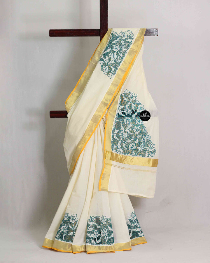 Kerala Kasavu Saree with Blue Floral Twine Cutwork