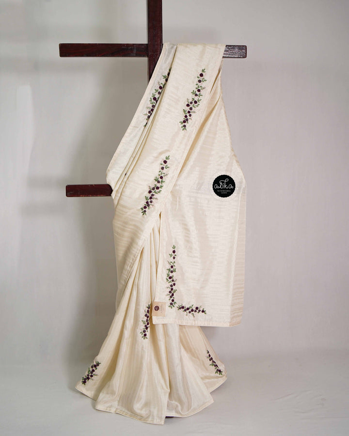 Cream Designer Silk Saree with Floral Purple Hand Embroidery
