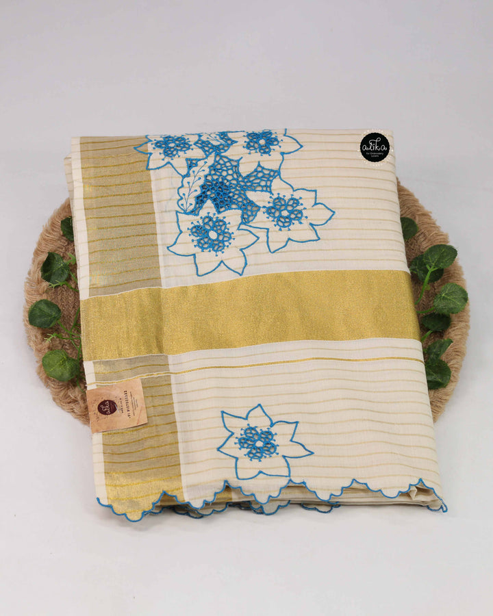 Cream Kerala Saree with Golden Stripes &amp; Blue Cutwork