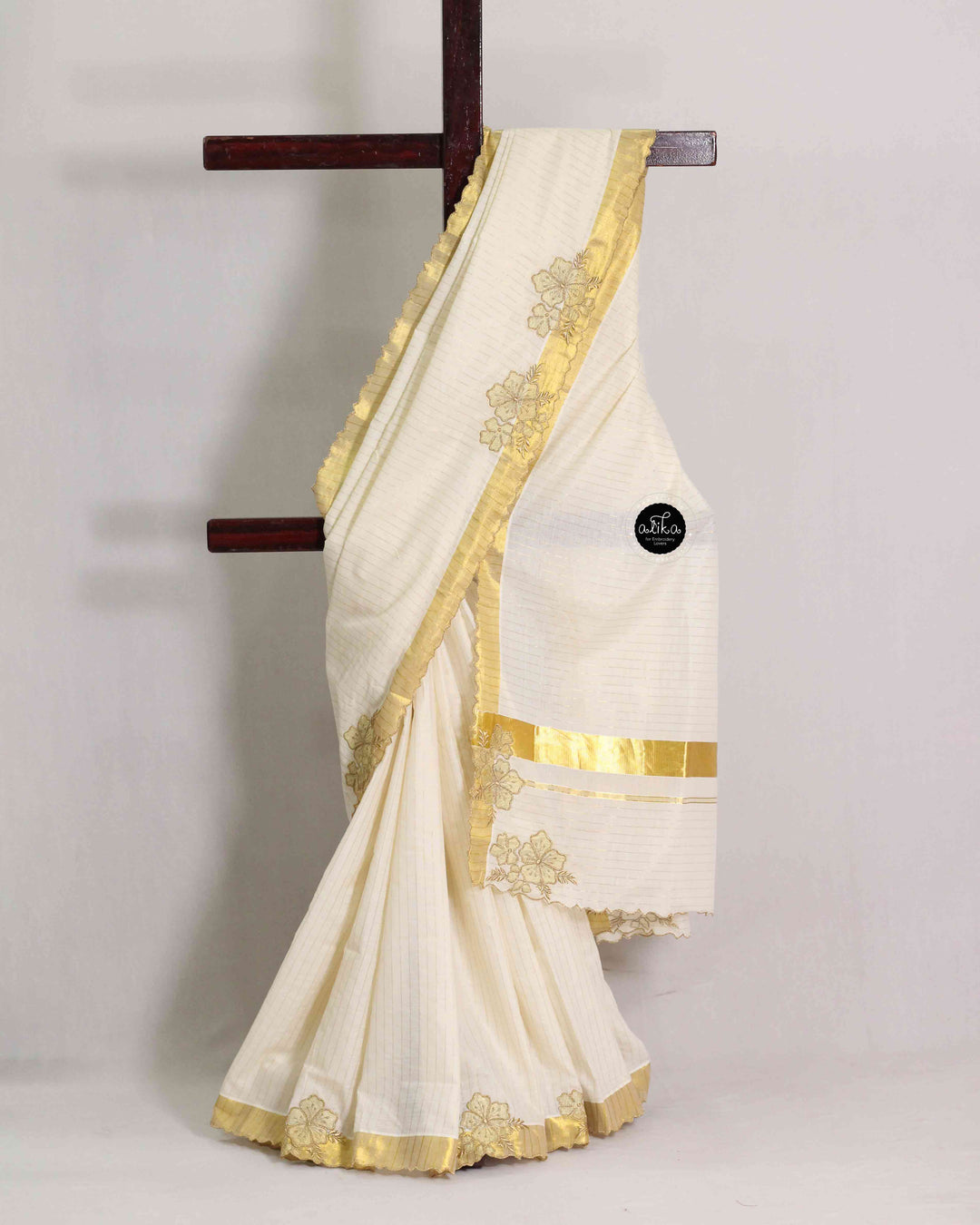 Kerala Kasavu Saree with Floral Appliqué Work