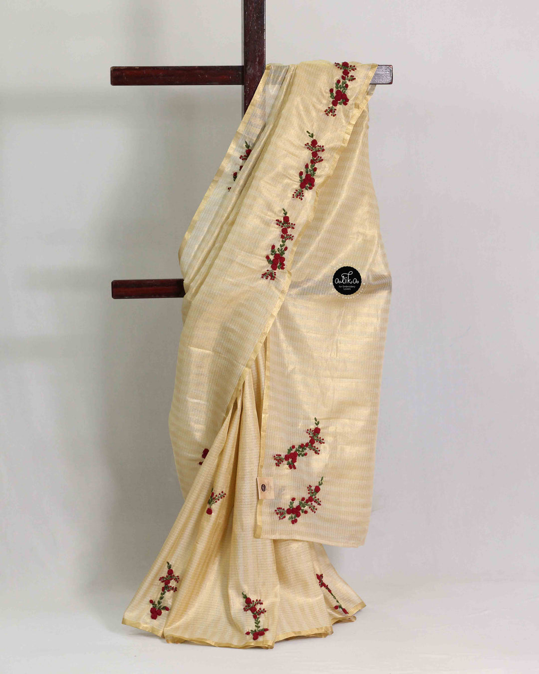 Gold Tissue Saree with Maroon Floral Hand Embroidery
