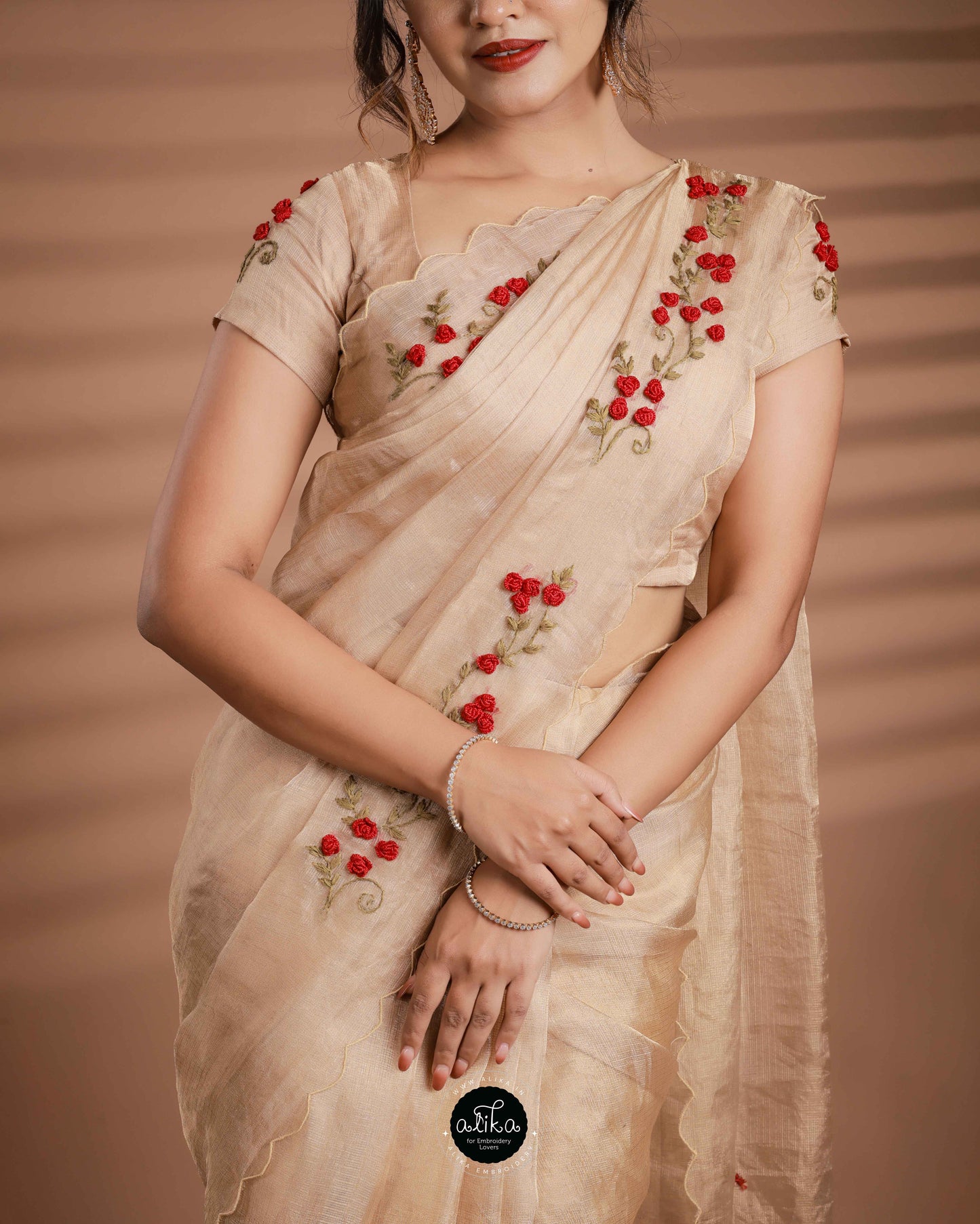 Pure golden tissue saree with floral hand embroidery