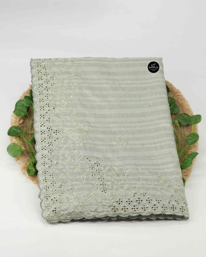 Light Sage Green Semi Silk Saree with Floral Machine Embroidery and Cutwork Border