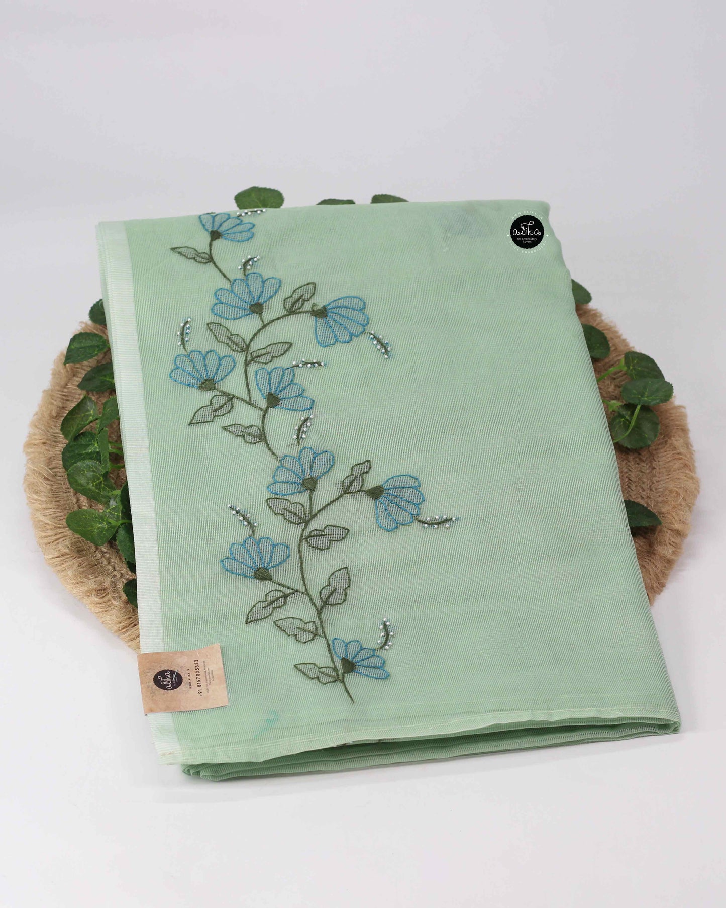 Pista Green Kota Saree with Floral Shadow and Bead Work