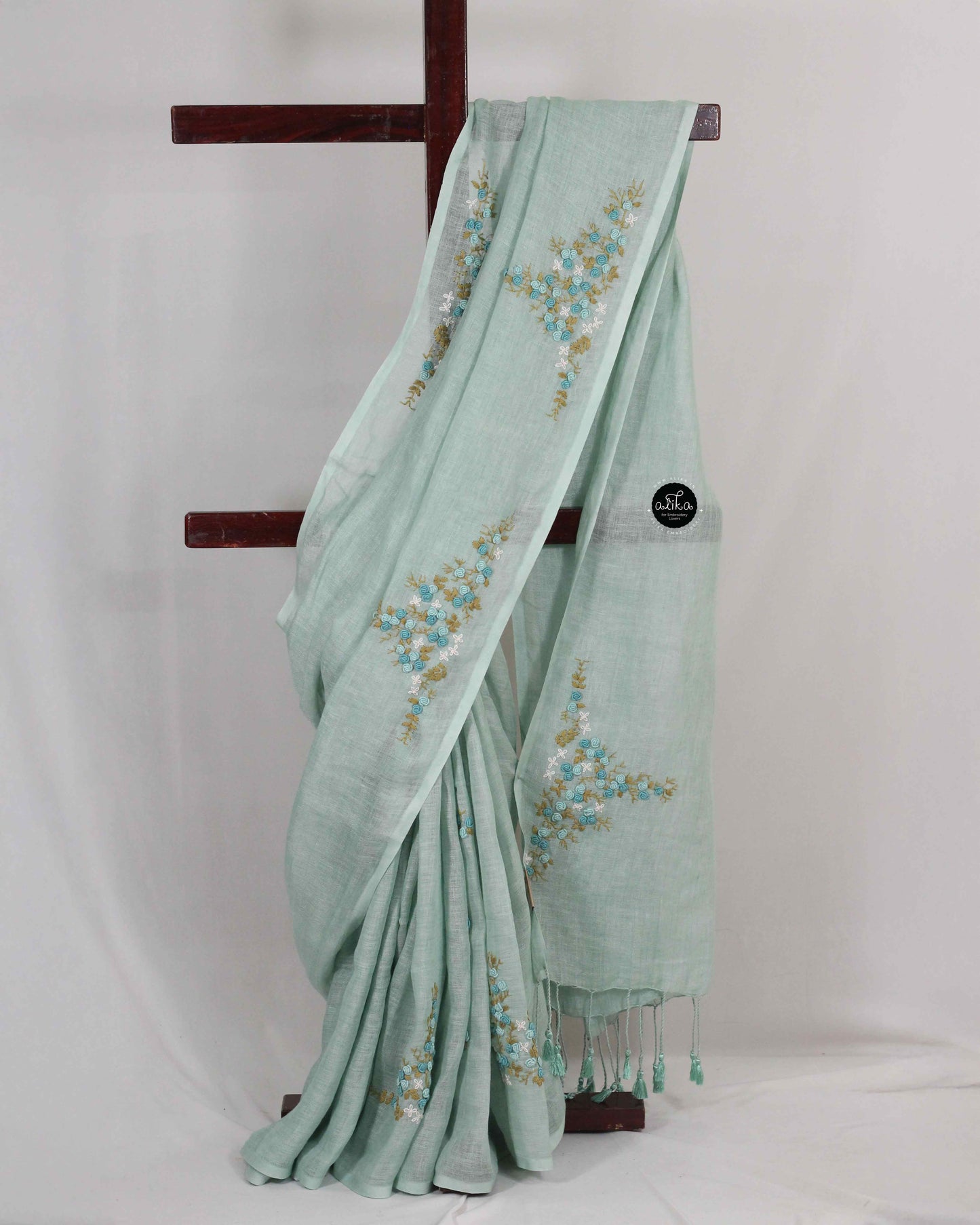 Bright Sea Green Pure Linen Saree with Floral Hand Embroidery