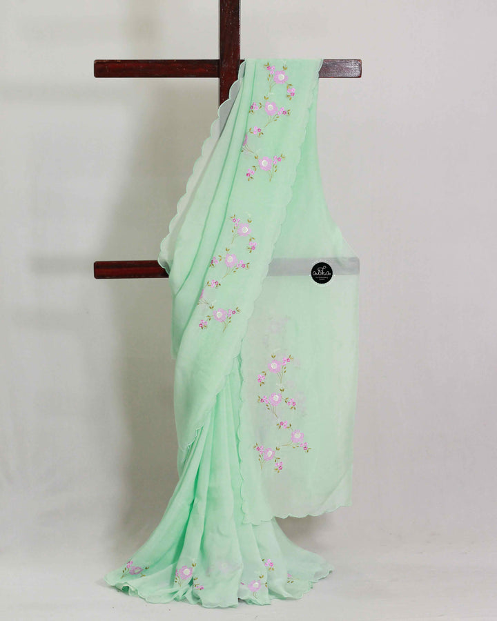 Light Aqua Green Organza Saree with Floral Machine Embroidery
