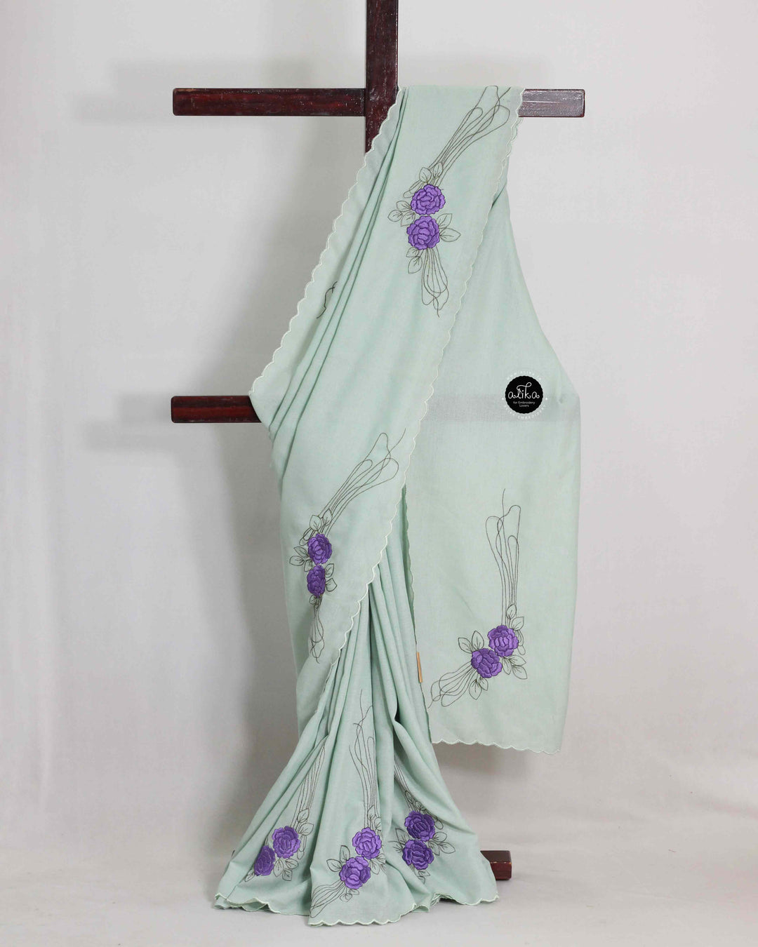 LIGHT GREEN SOFT SILK Saree WITH VIOLET FLORAL MACHINE EMBROIDERY