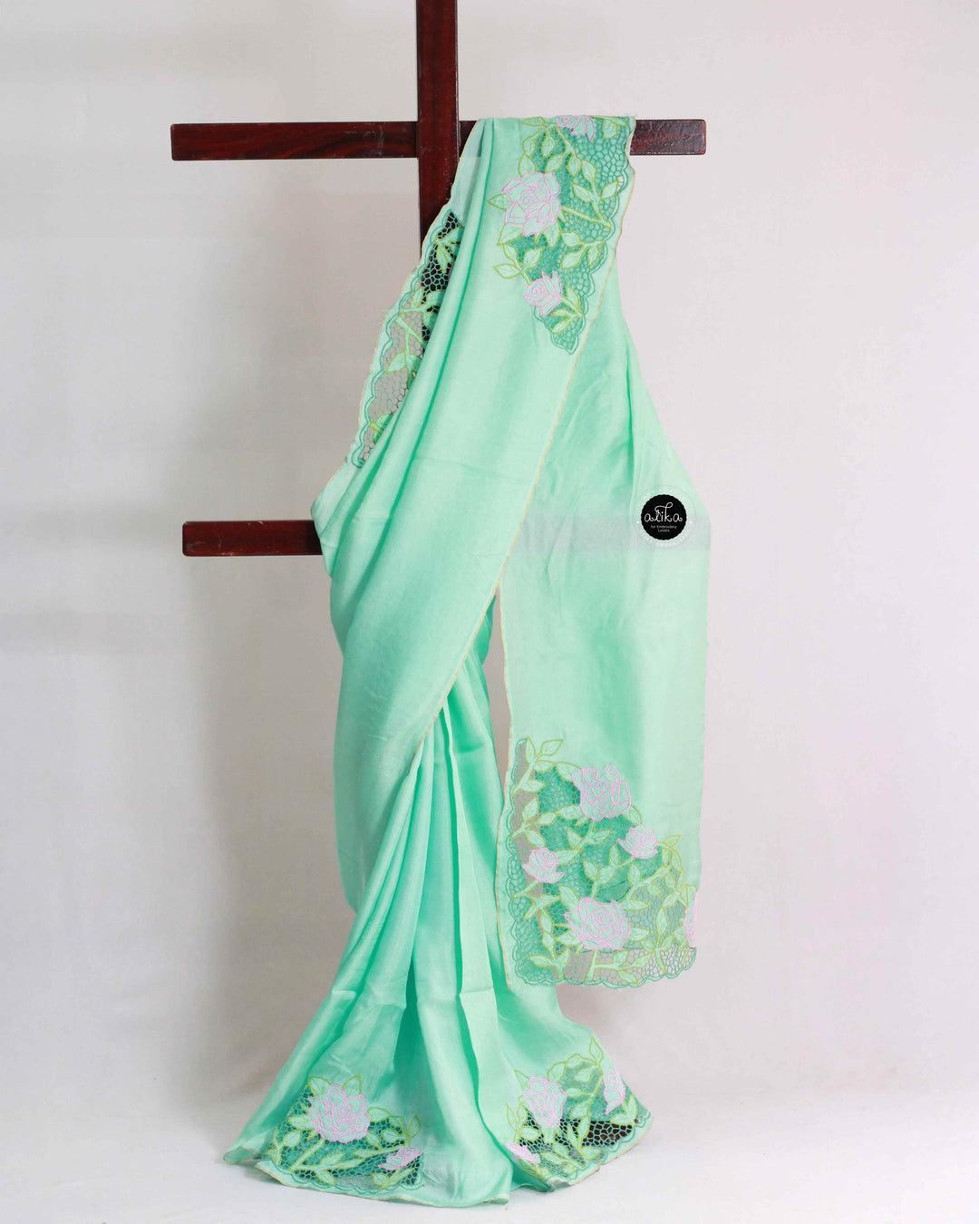 Aqua Green Crispy Georgette Saree with Floral Twine Cutwork