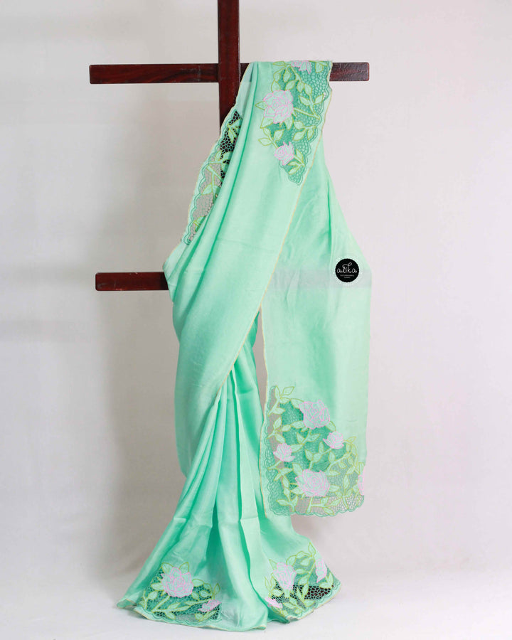 Aqua Green Crispy Georgette Saree with Floral Twine Cutwork
