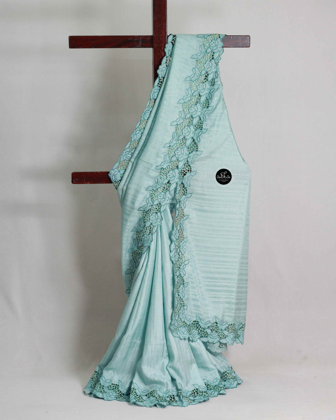 Pastel Blue Semi Silk Saree with Floral Full Border Cutwork