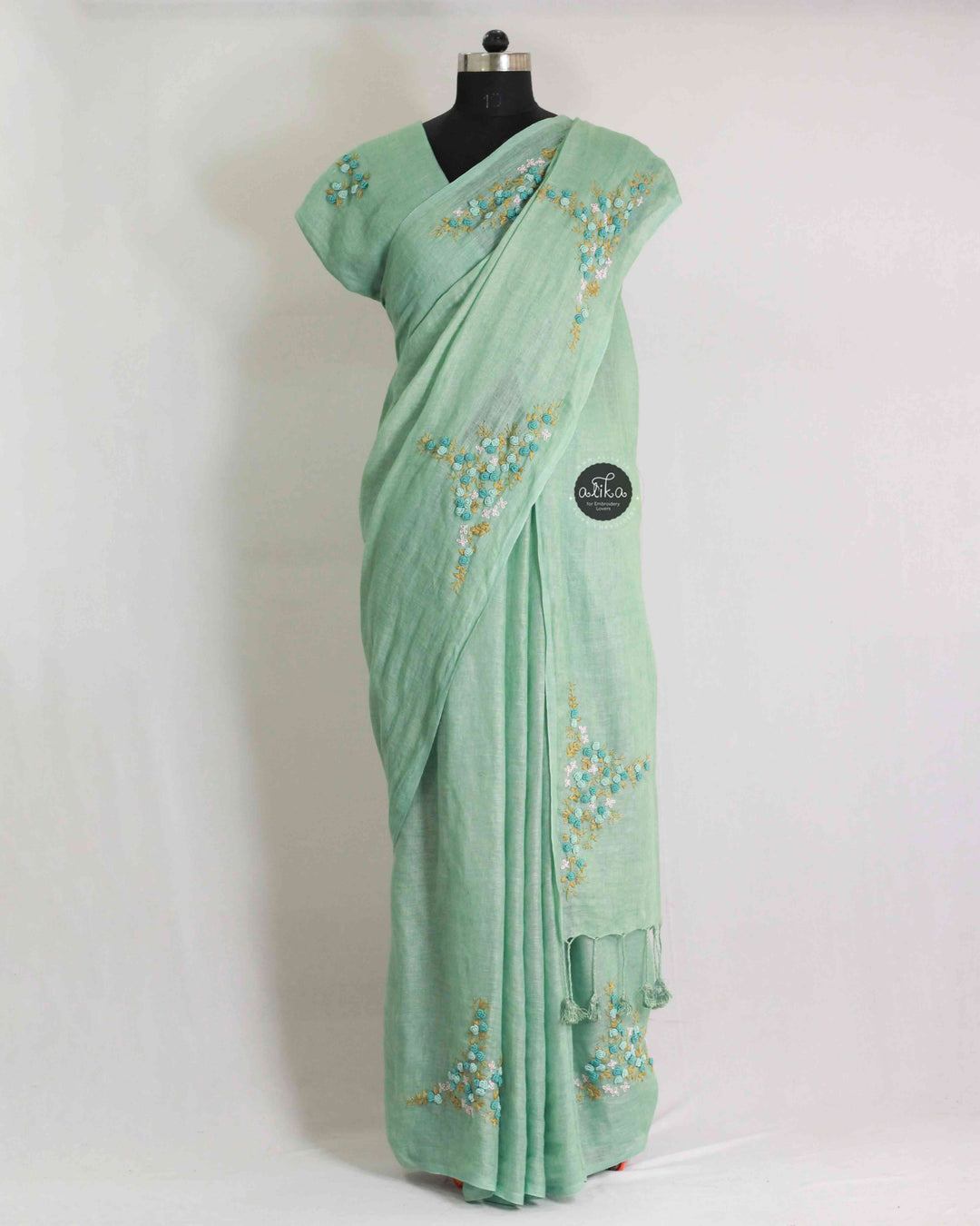 Bright Sea Green Pure Linen Saree with Floral Hand Embroidery