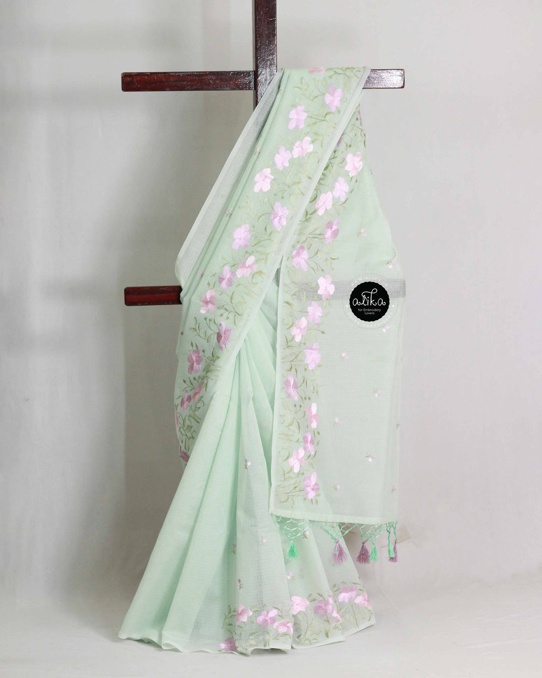 Mint Green Silky Kota Saree with Floral Machine Embroidery