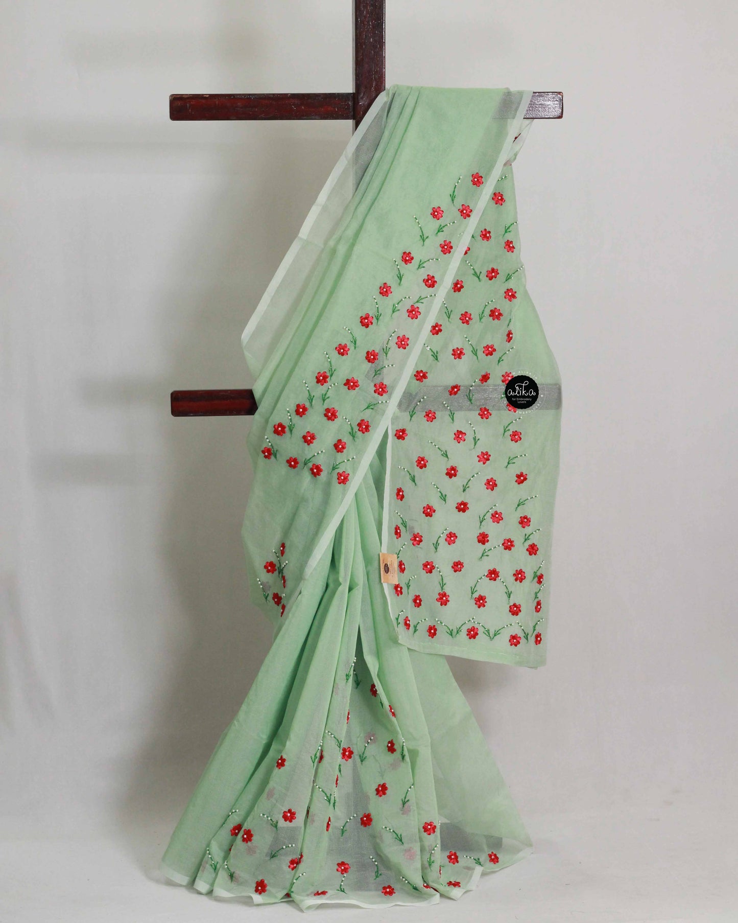 Mint Green Kota Saree with Red Floral Ribbon Work