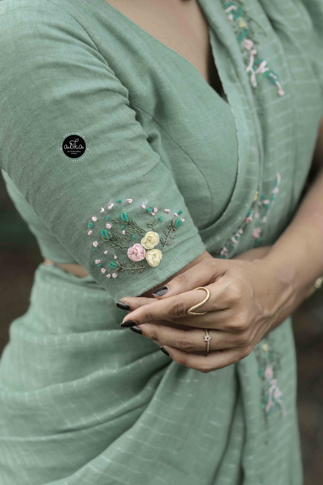 Turquoise Green Pure Linen Saree with Silver Linen Stripes &amp; Floral Hand Embroidery