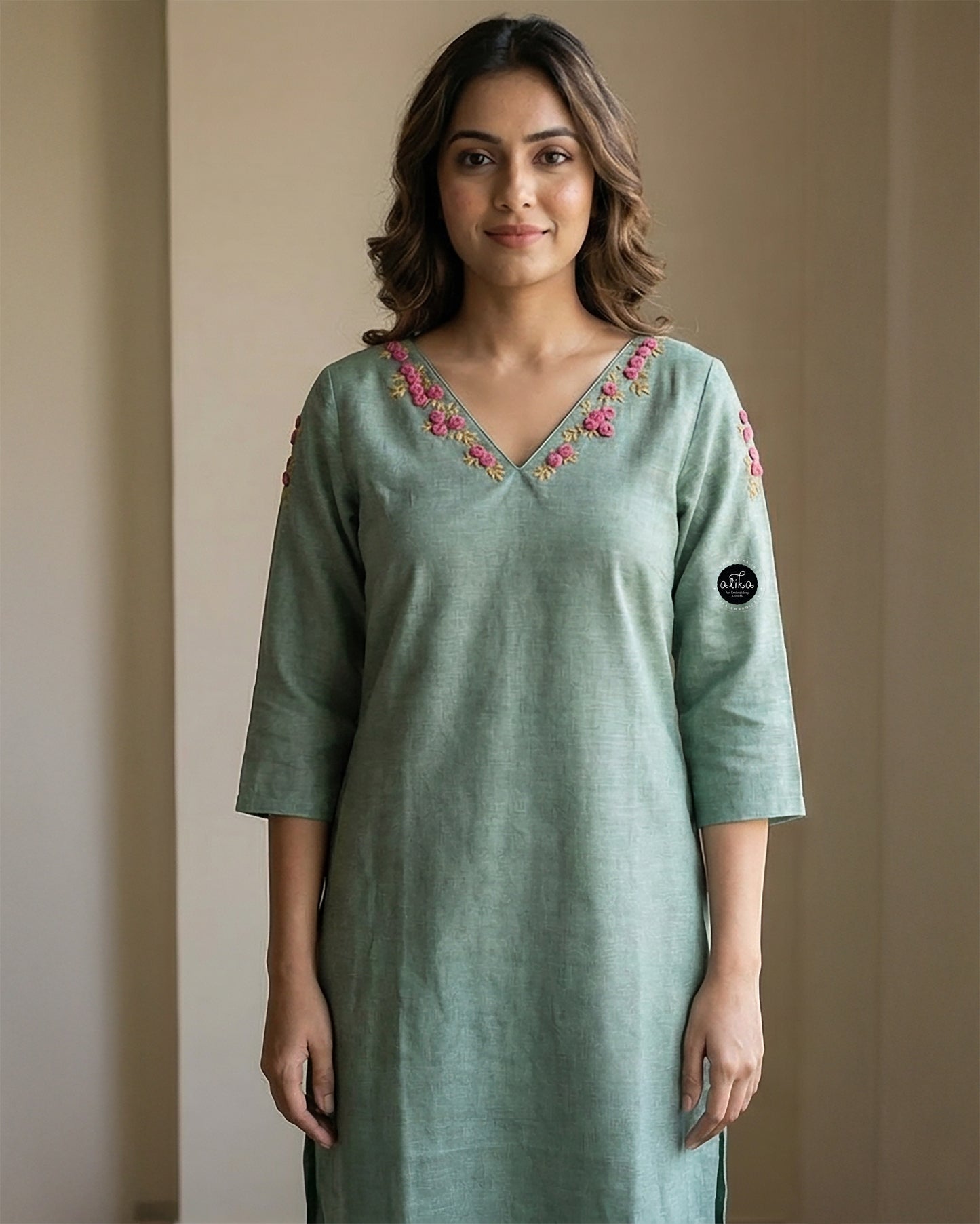Mint Green Semi-Linen Stitched Kurti with Floral Hand Embroidery on Neckline & Sleeves