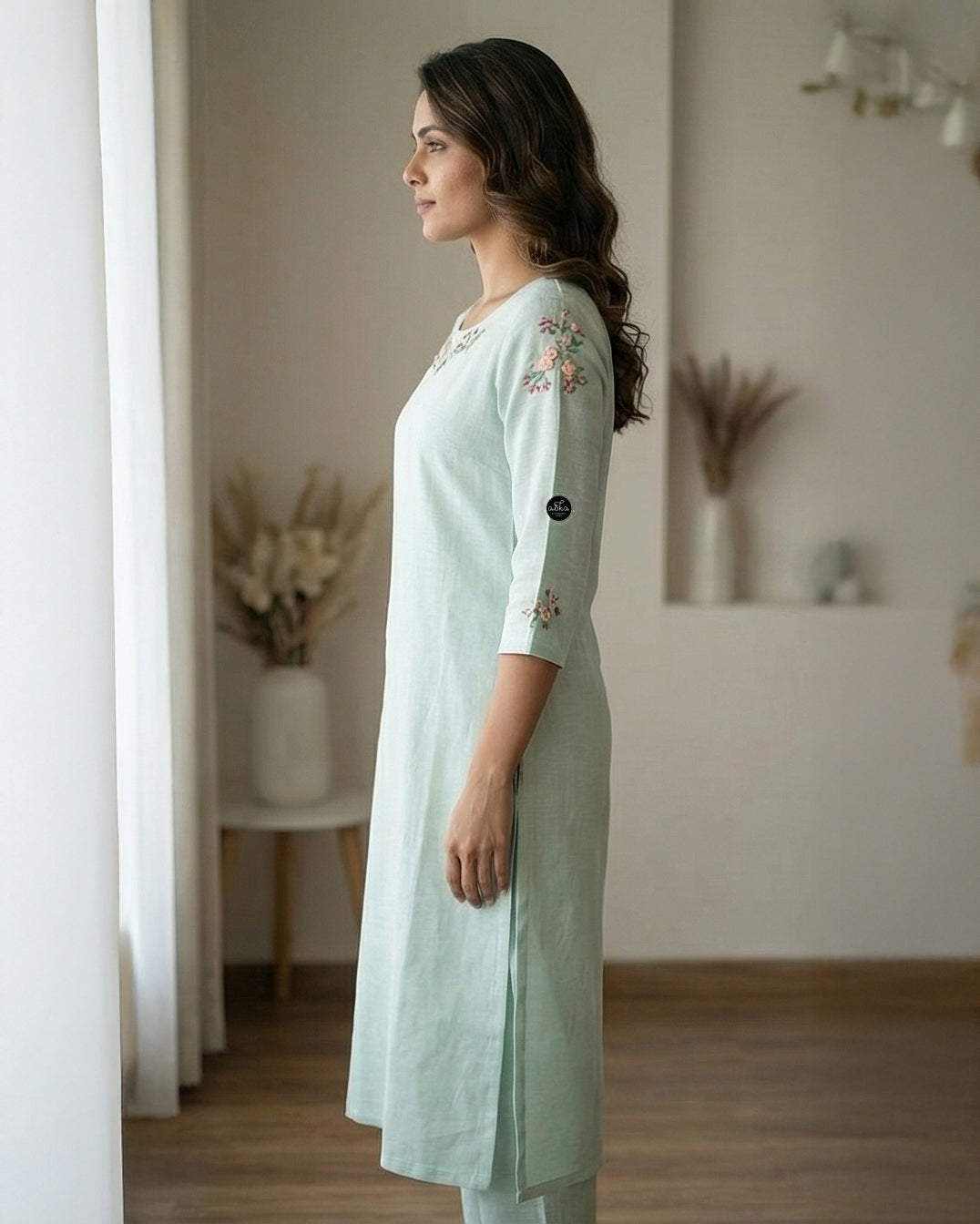 Mint green Semi-Linen Stitched Kurti with Floral Hand Embroidery on Neckline & Top of the Sleeves