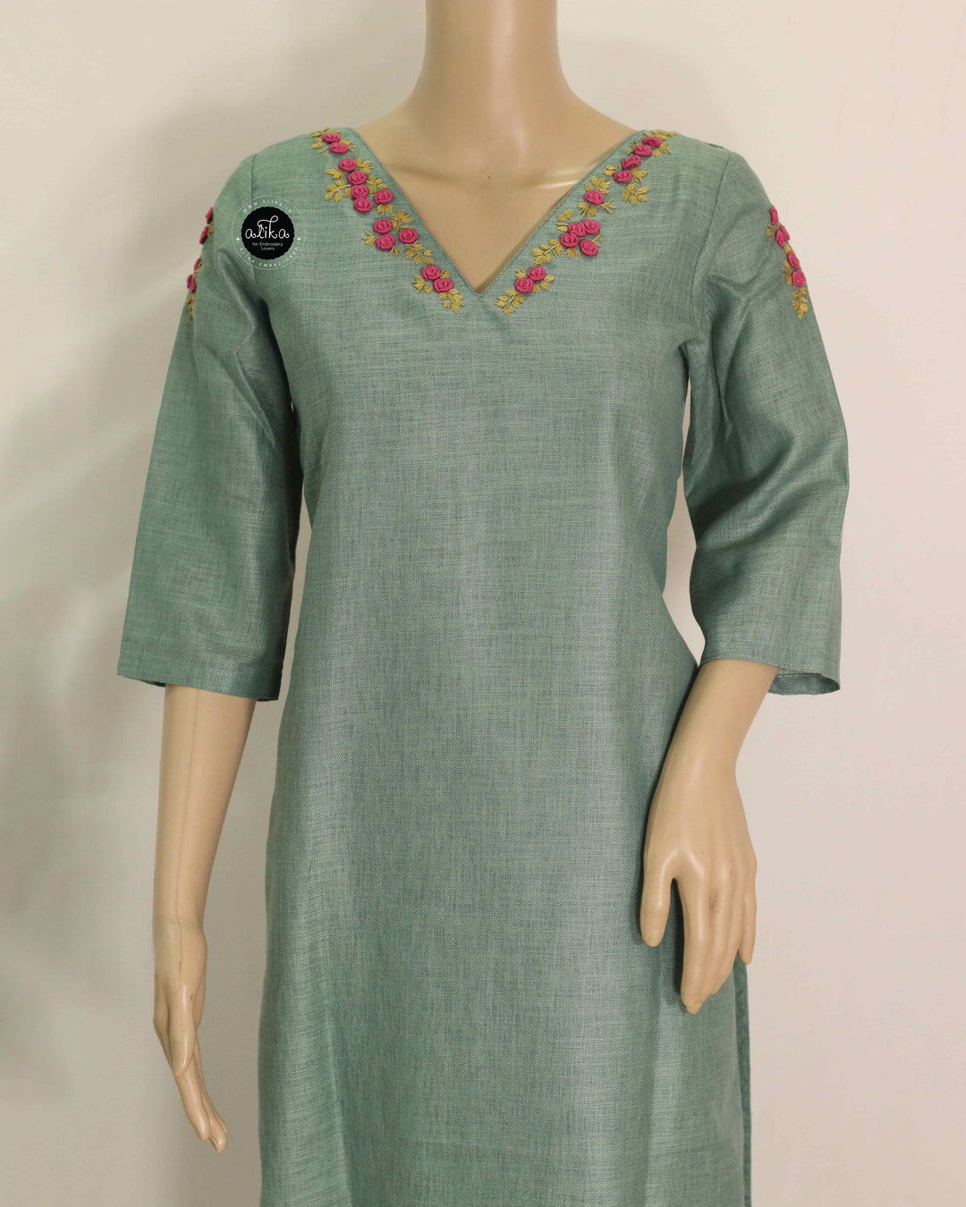 Mint Green Semi-Linen Stitched Kurti with Floral Hand Embroidery on Neckline &amp;