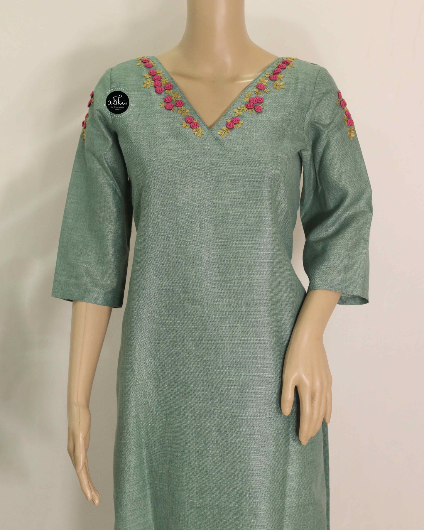 Mint Green Semi-Linen Stitched Kurti with Floral Hand Embroidery on Neckline & Sleeves