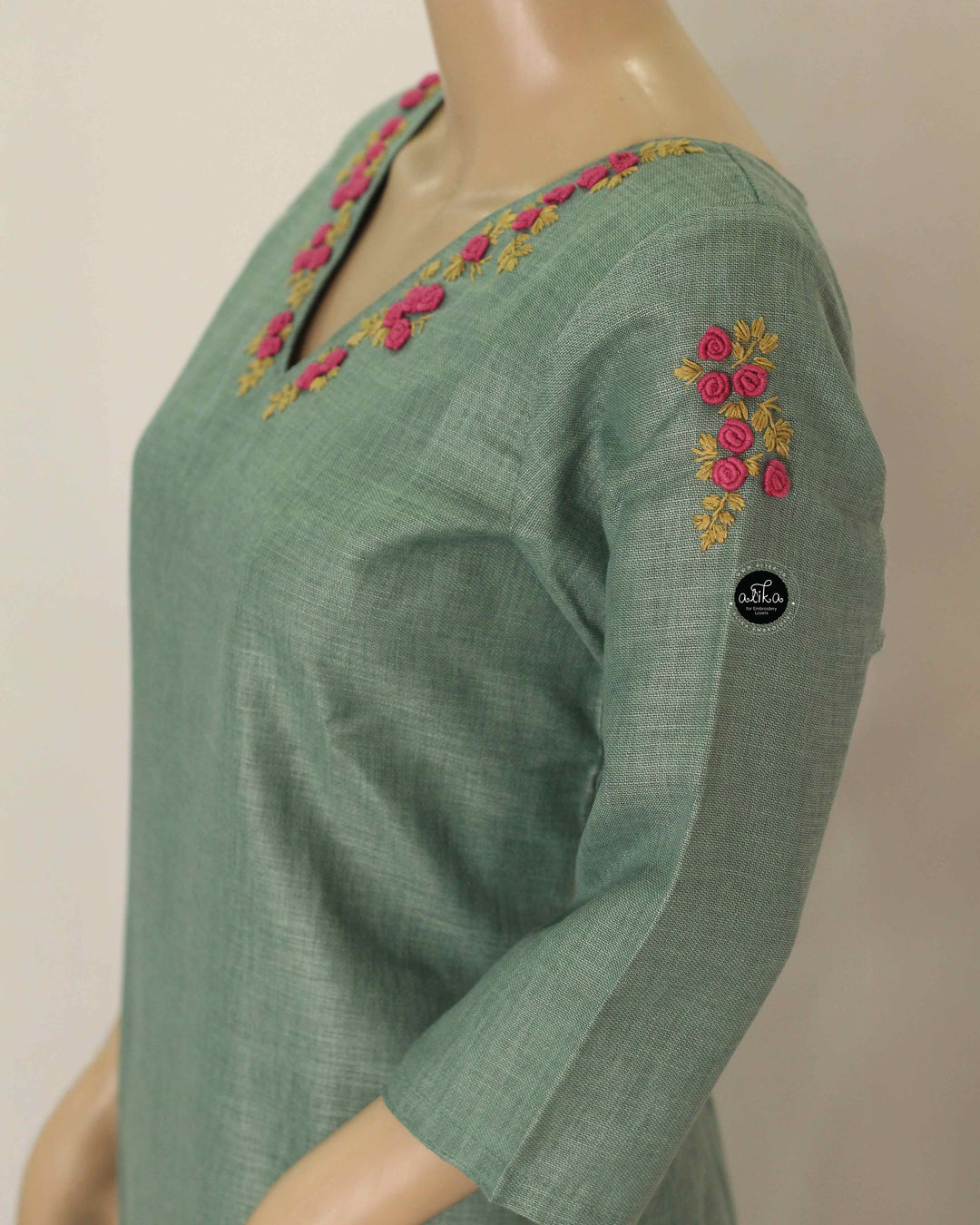 Mint Green Semi-Linen Stitched Kurti with Floral Hand Embroidery on Neckline &amp;