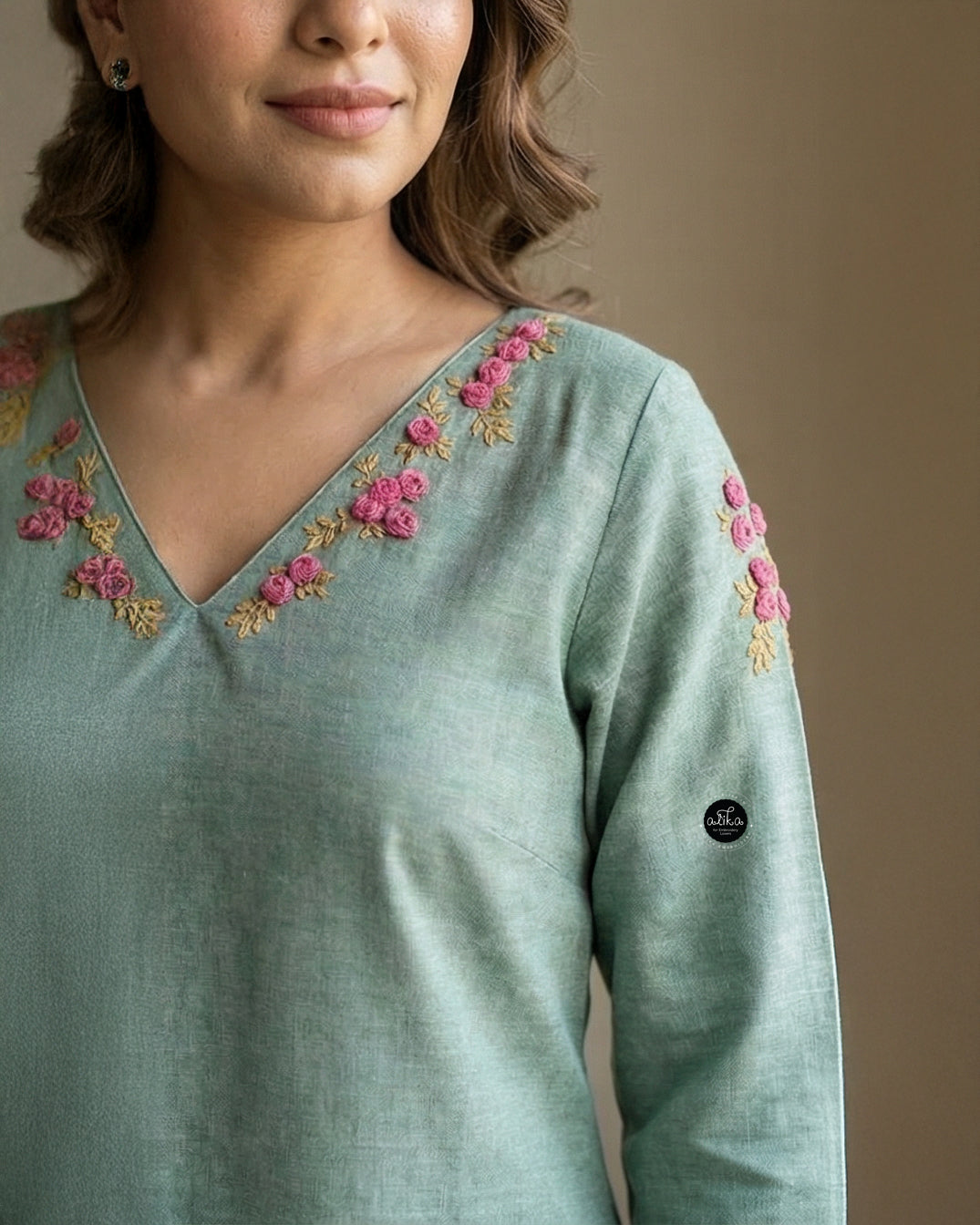 Mint Green Semi-Linen Stitched Kurti with Floral Hand Embroidery on Neckline &amp;