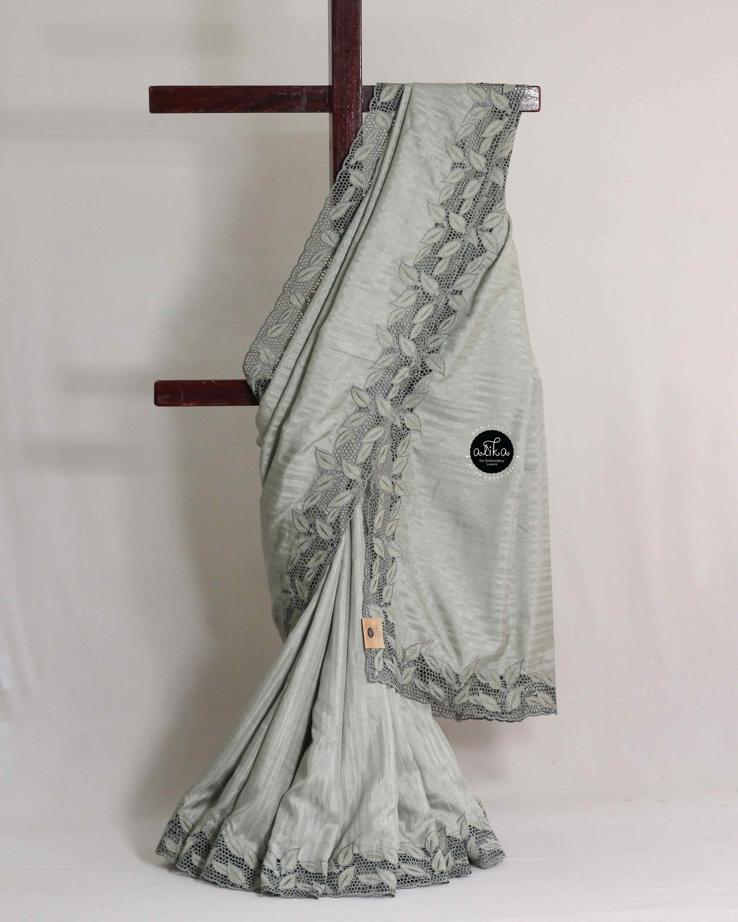 Light Grey Semi Silk Saree with Floral Full Border Cutwork