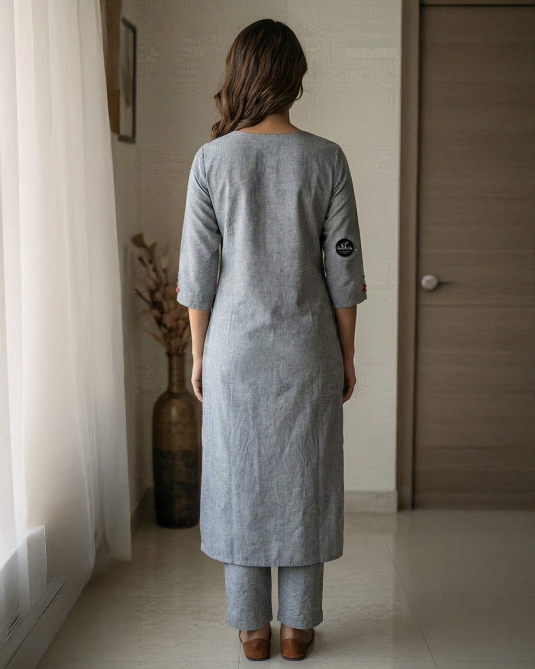Gray Semi-Linen Stitched Kurti with Floral Hand Embroidery on Neckline & Top of the Sleeves