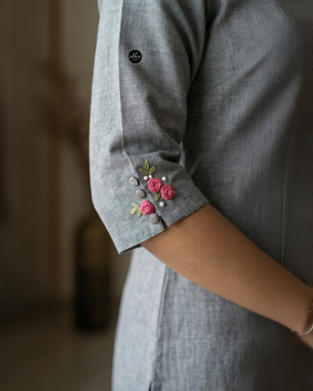Gray Semi-Linen Stitched Kurti with Floral Hand Embroidery on Neckline & Top of the Sleeves