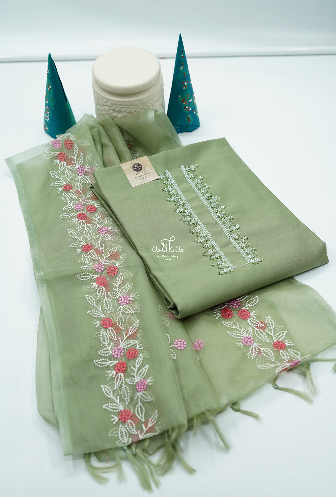 SEMI SILKLIGHT GREEN  SALWAR MATERIAL WITH SAME SHADED BOTTOM AND EMBROIDERIED ORGNZA DUPATTA