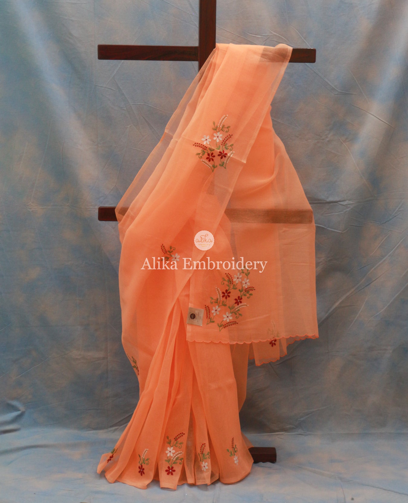 Vibrant Orange Kota Saree with Red and White Floral Machine Embroidery | Effortless Elegance