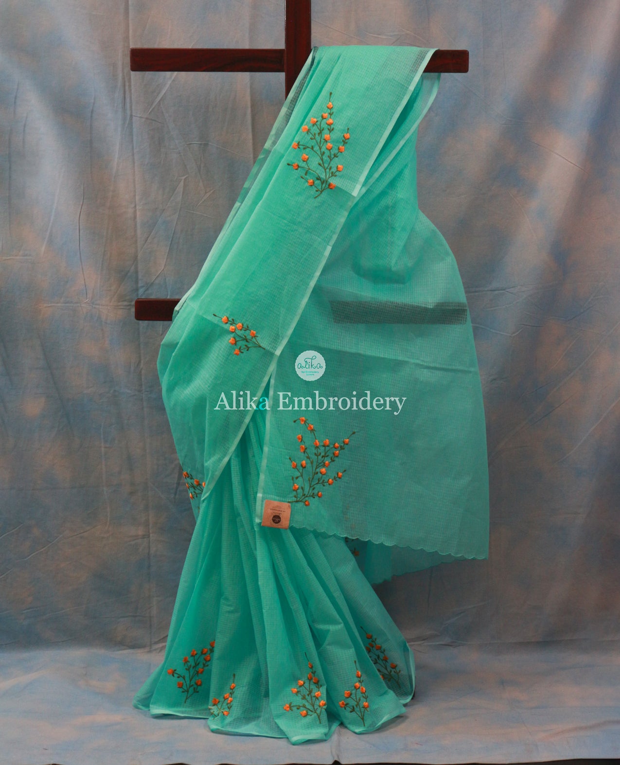 Elegant Green Kota Saree with Orange Floral Machine Embroidery | Vibrant Sophistication