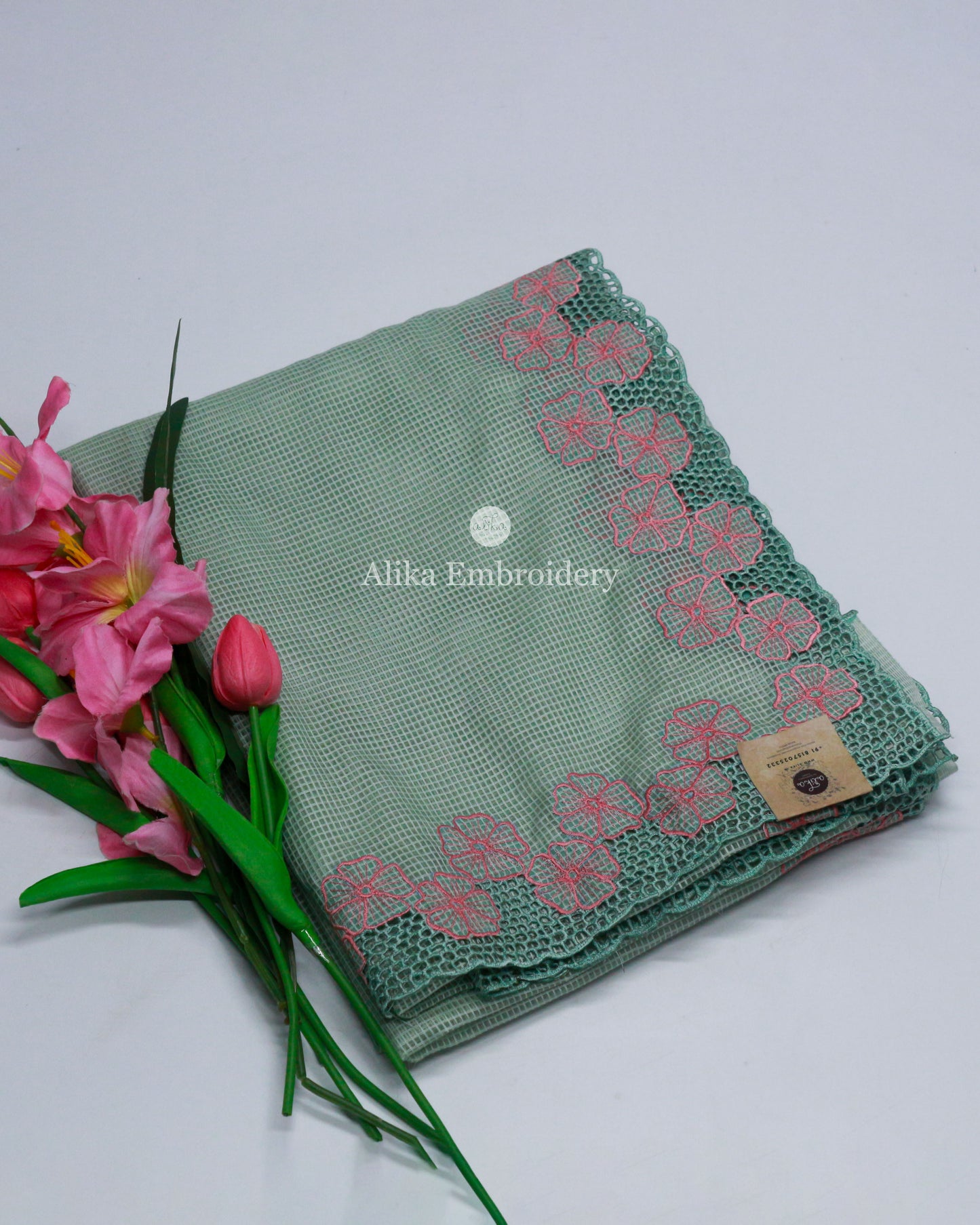 Enchanting Green Shaded checkedSemi Tussar Saree with Floral Embroidery and Full Border Cutwork