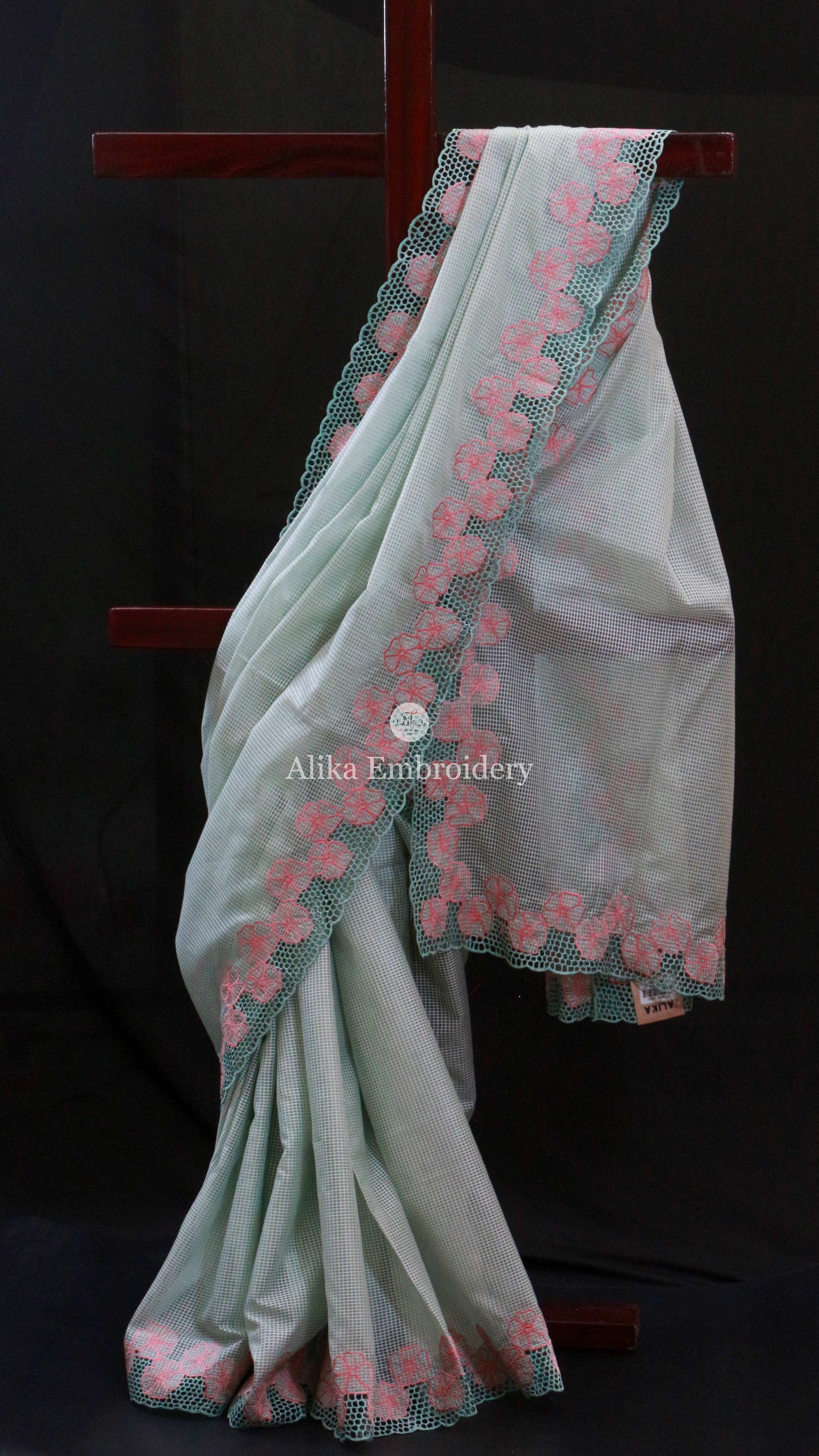 Enchanting Green Shaded checkedSemi Tussar Saree with Floral Embroidery and Full Border Cutwork