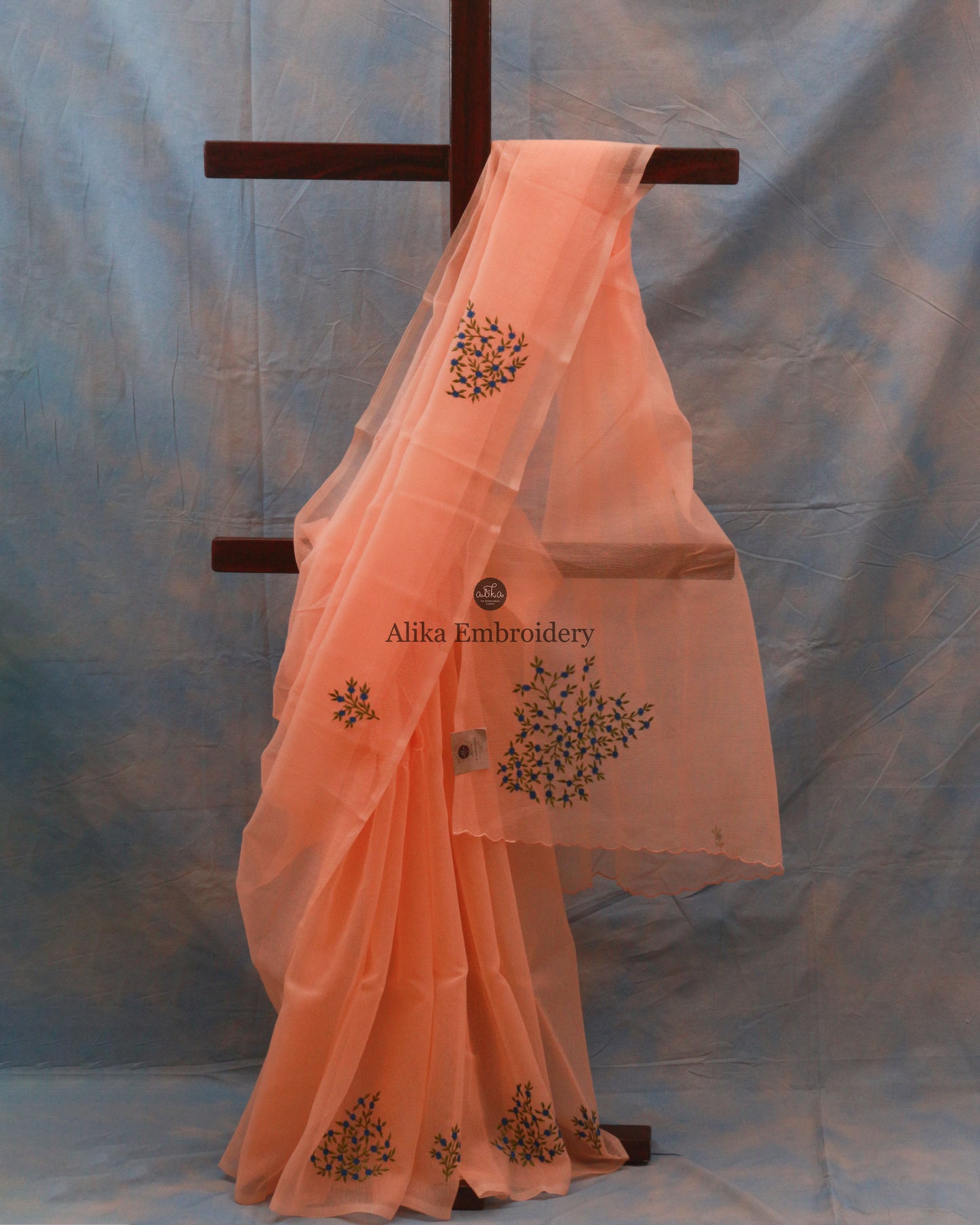 Elegant Peach Kota Saree with Blue Floral Embroidery | Perfect Blend of Grace