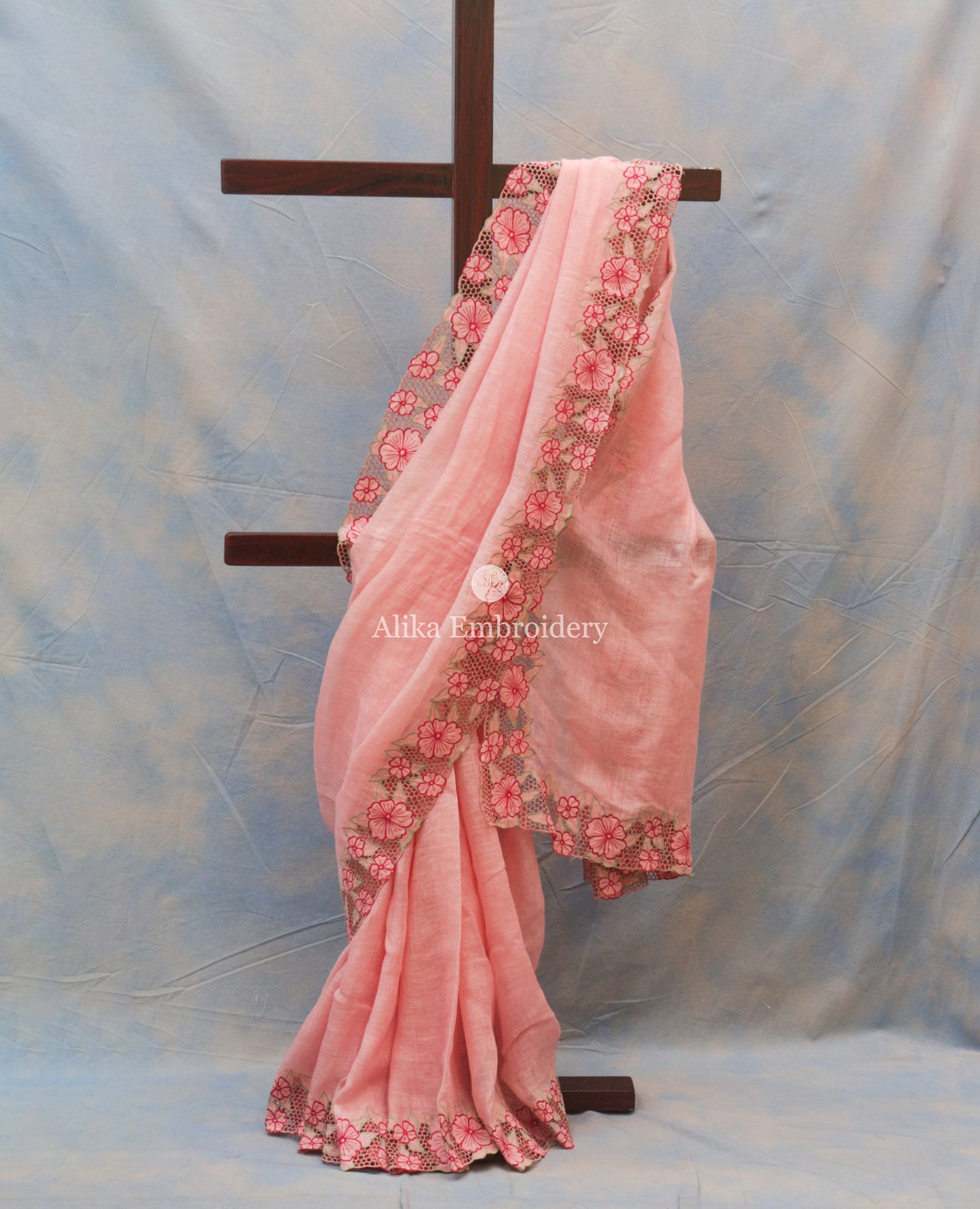 Elegant pink Linen Saree with Full Border Cut Work