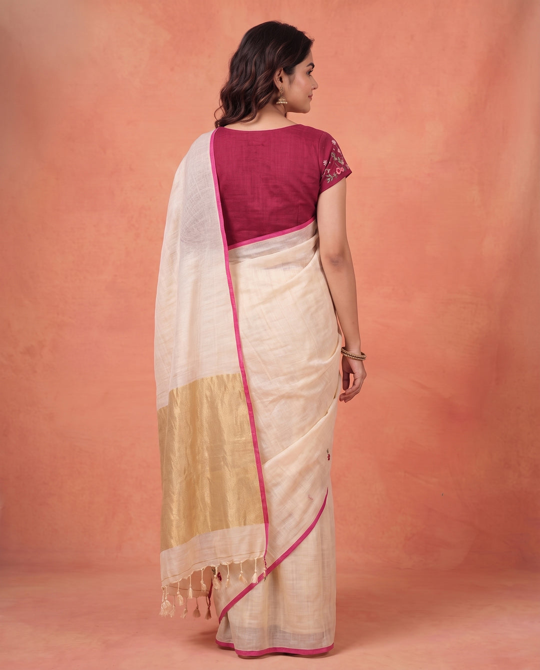 Cream Pure Linen Onam Saree with Golden Zari Pallu &amp; Multicolour Floral Hand Embroidery